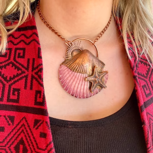 handmade electroformed starfish onto a sea shell pendant necklace