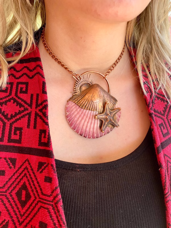 handmade electroformed starfish onto a sea shell pendant necklace